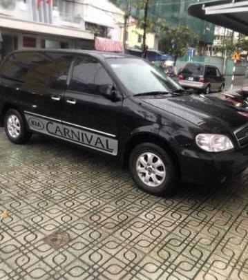 Cần bán Kia Carnival 2007, màu đen, giá 255 triệu