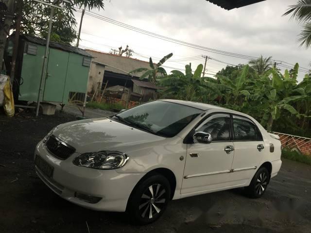 Cần bán lại xe Toyota Corolla altis đời 2003, màu trắng xe gia đình giá cạnh tranh