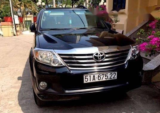 Bán xe cũ Toyota Fortuner đời 2013, màu đen số tự động