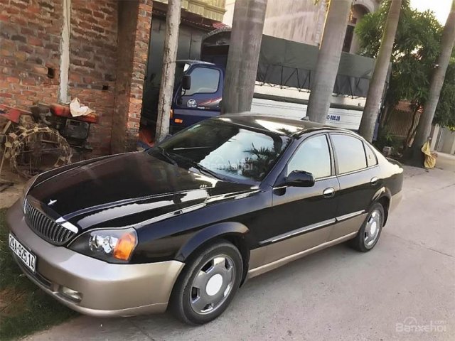 Cần bán lại xe Daewoo Magnus đời 2004, màu đen, nhập khẩu chính hãng số tự động