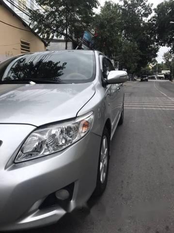 Cần bán xe Toyota Corolla Altis 1.8AT năm 2009, màu bạc, nhập khẩu ít sử dụng