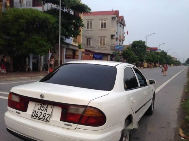 Bán Mazda 323 đời 1997, màu trắng, giá 95tr