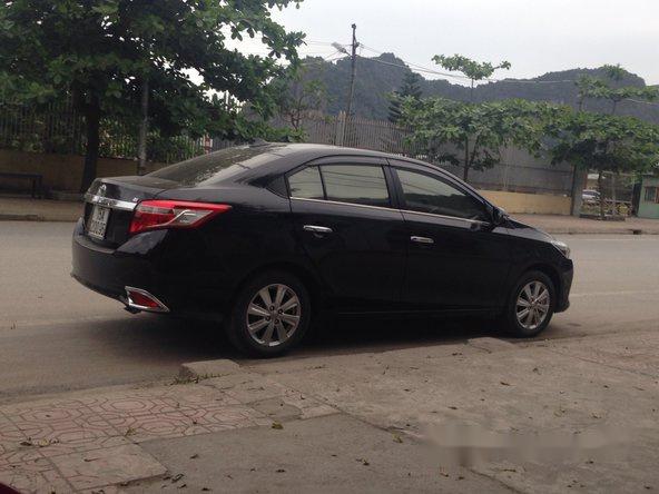 Bán xe cũ Toyota Vios 2015, màu đen số sàn, giá tốt