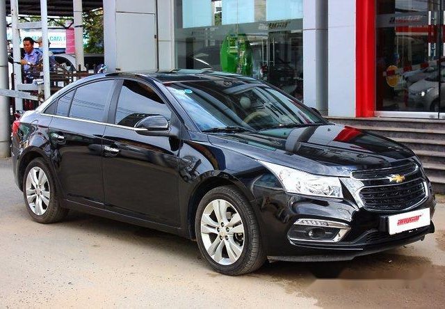 Bán xe Chevrolet Cruze LTZ 1.8AT 2015, màu đen, lắp ráp trong nước, đăng ký tên tư nhân lần đầu 09/2015