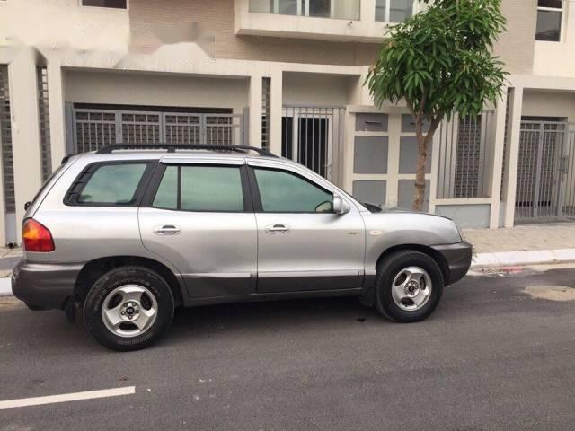 Cần bán gấp Hyundai Santa Fe AT đời 2003 xe gia đình