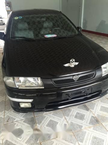 Bán xe Mazda 323 đời 2000, màu đen, giá tốt