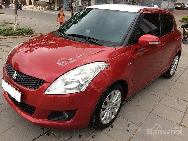 Cần bán Suzuki Swift đời 2014, màu trắng đỏ, 470tr