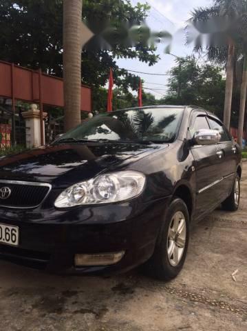 Cần bán xe Toyota Corolla Altis đời 2002, màu đen, giá chỉ 235 triệu