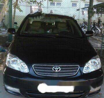 Bán Toyota Corolla altis 2003, màu đen số sàn, 270tr