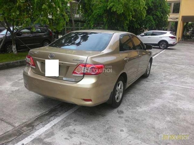 Cần bán gấp xe Toyota Corolla XLI 1.6 AT đời 2010, chính chủ màu vàng cát, xe gia đình nhập khẩu nguyên chiếc