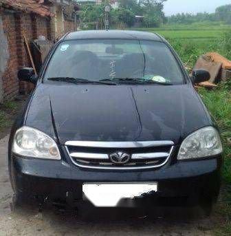 Bán xe Daewoo Lacetti MT sản xuất 2009, màu đen  