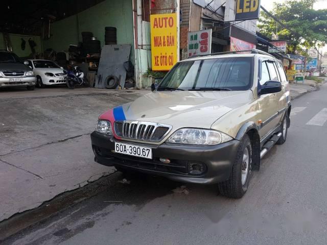 Bán Ssangyong Musso đời 2003, màu vàng, máy dầu