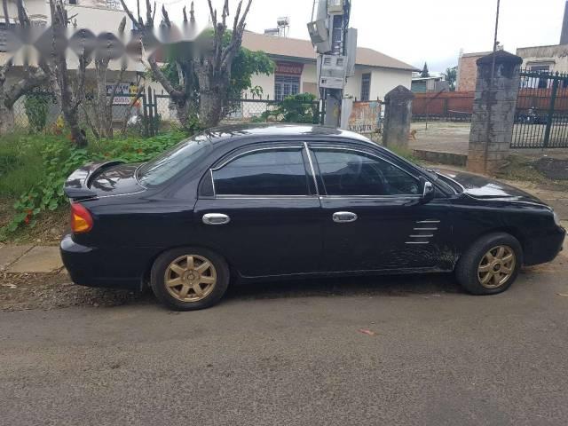 Cần bán xe Kia Spectra đời 2005, màu đen xe gia đình, giá chỉ 132 triệu