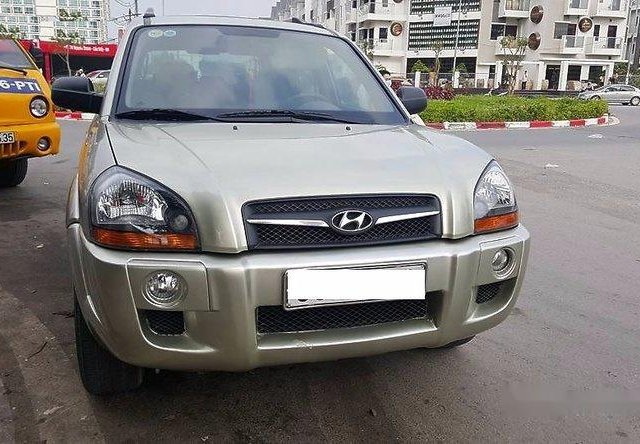 Bán Hyundai Tucson 4WD đời 2009, màu vàng số tự động