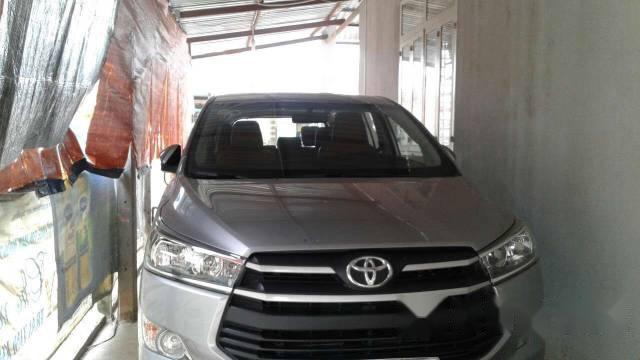 Bán xe cũ Toyota Innova đời 2016, màu bạc còn mới