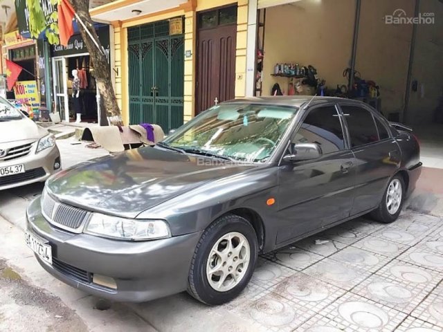 Gia đình bán Mitsubishi Lancer đời 2003, màu xám