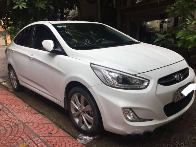 Bán xe cũ Hyundai Accent 1.4AT đời 2015, màu trắng, xe nhập