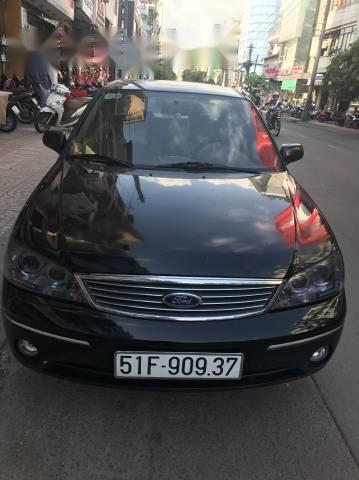 Bán Ford Laser 1.8MT đời 2003, màu đen số sàn