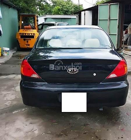 Cần bán gấp Kia Spectra đời 2005, màu đen xe gia đình