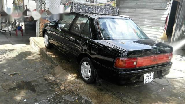 Bán Mazda 323 đời 1995, màu đen, giá chỉ 45 triệu