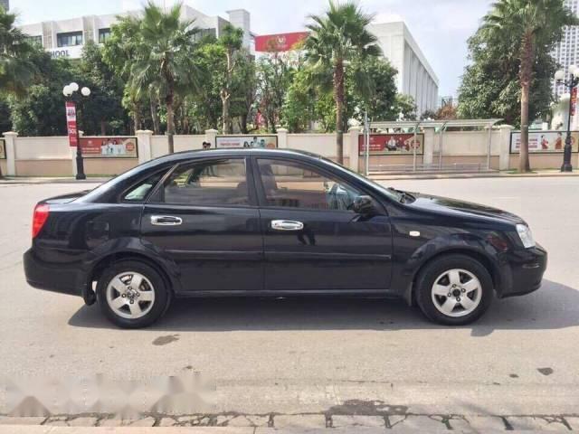 Cần bán Daewoo Lacetti EX 1.6 đời 2010, màu đen chính chủ