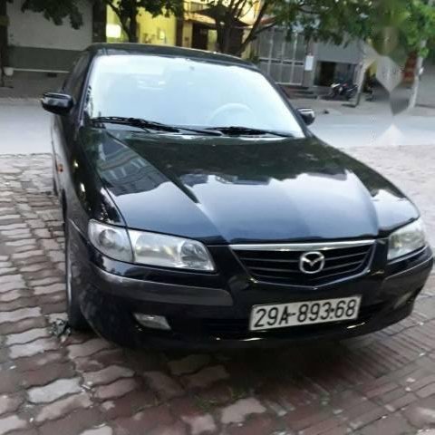 Cần bán xe Mazda 626 đời 2002, màu đen