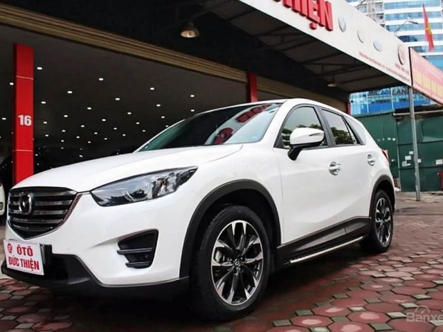 Cần bán xe Mazda CX 5 2.5AT 2WD đời 2016, màu trắng như mới