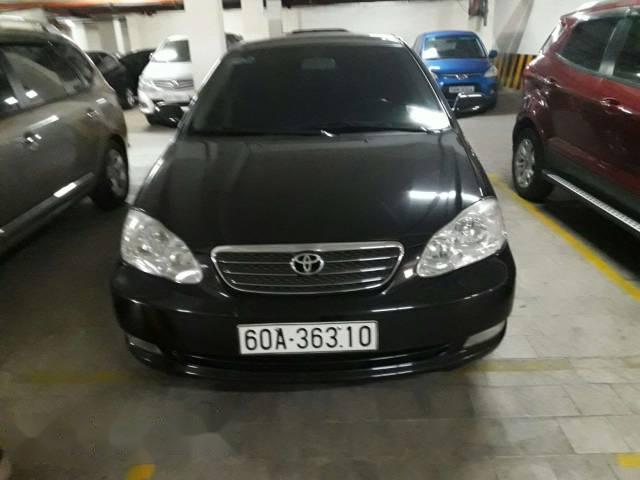 Bán xe cũ Toyota Corolla 1.8 đời 2005, màu đen còn mới, giá 390tr