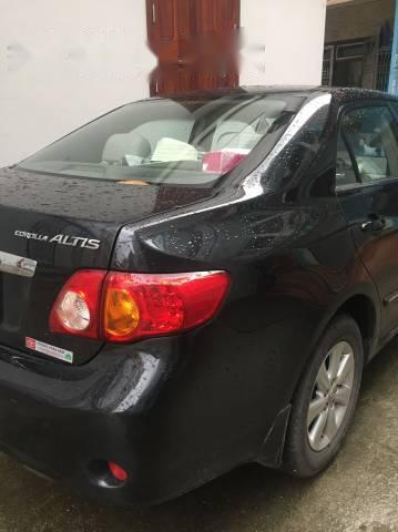 Bán ô tô Toyota Corolla Altis sản xuất 2010, màu đen, 550 triệu