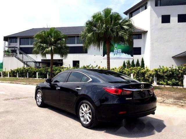 Cần bán xe Mazda 6 đời 2014, màu đen, giá 740tr