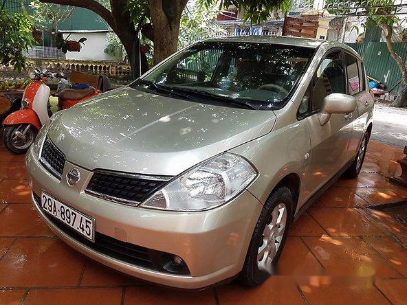 Bán ô tô Nissan Tiida 1.4MT đời 2007, màu vàng, xe nhập số sàn