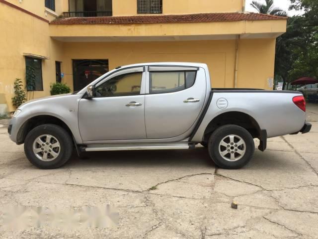 Bán Mitsubishi Triton đời 2012, màu bạc số sàn