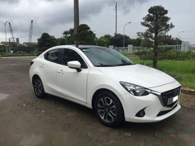 Cần bán Mazda 2 năm 2015, màu trắng, nhập khẩu Thái như mới