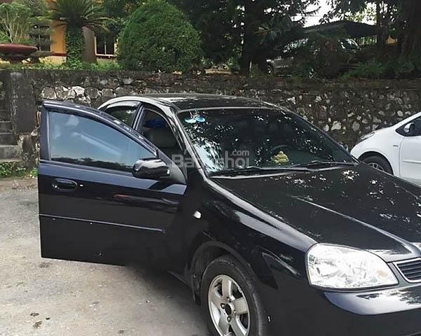 Bán Daewoo Lacetti EX 1.6 MT đời 2004, màu đen xe gia đình, giá chỉ 180 triệu