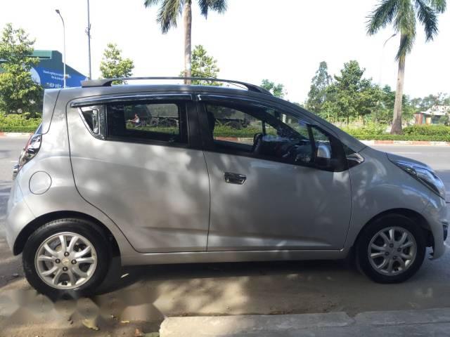 Cần bán xe Chevrolet Spark LT đời 2013, màu bạc như mới giá cạnh tranh