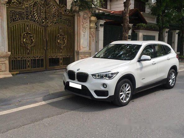 Cần bán xe BMW X1 Sdrive 1.8l đời 2016, màu trắng, nhập khẩu nguyên chiếc số tự động