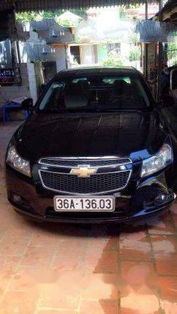 Bán Chevrolet Cruze đời 2010, màu đen số sàn, 305tr