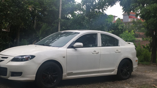 Bán Mazda 3 2.0 AT đời 2009, màu trắng, giá chỉ 395 triệu