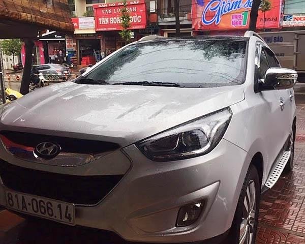 Gia đình bán Hyundai Tucson đời 2014, màu bạc, nhập khẩu