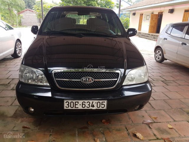 Bán ô tô Kia Carnival đời 2008, màu đen, số sàn