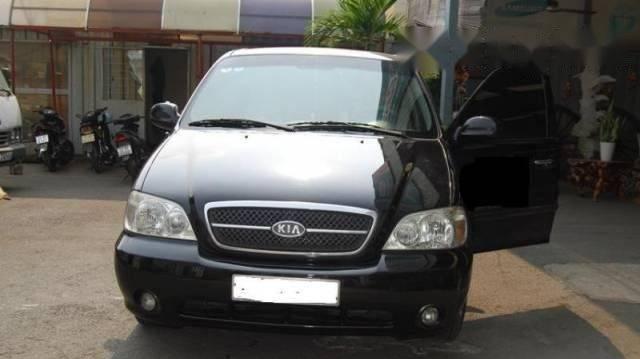 Bán ô tô Kia Carnival đời 2009, màu đen số tự động