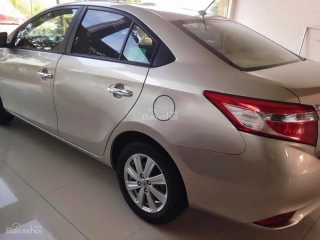 Cần bán lại xe Toyota Vios 1.5E CVT sản xuất 2016, màu ghi vàng 