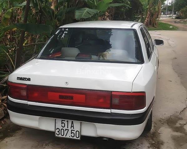 Bán Mazda 323 1995, màu trắng, 75 triệu