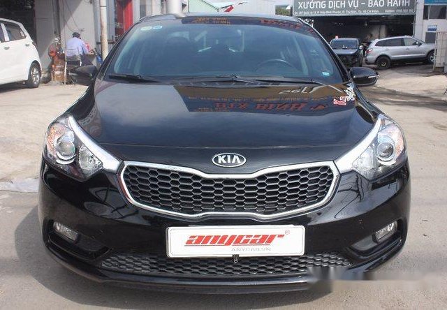 Bán xe Kia K3 1.6MT sản xuất 2015, màu đen số sàn, giá chỉ 495 triệu