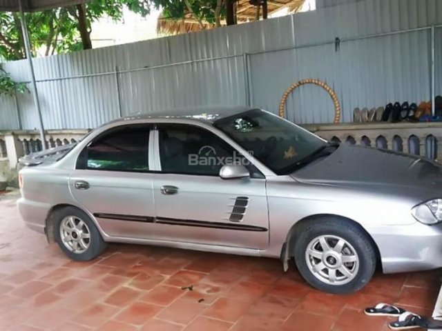 Bán Kia Spectra 1.6 MT đời 2004, màu bạc  