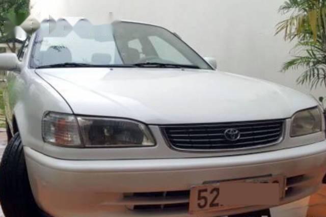 Cần bán Toyota Corolla GLI 1.6 đời 1999, màu trắng, nhập khẩu