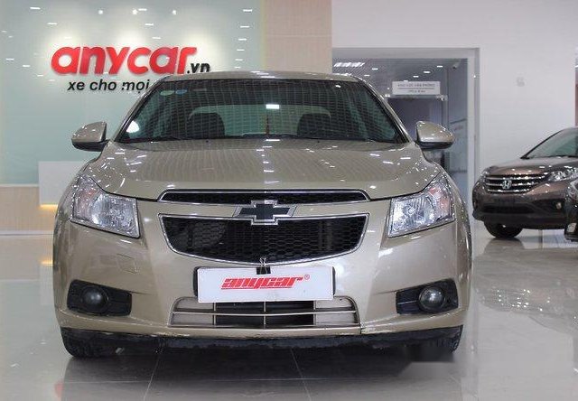 Bán Chevrolet Cruze đời 2011, màu vàng số sàn, giá 349tr