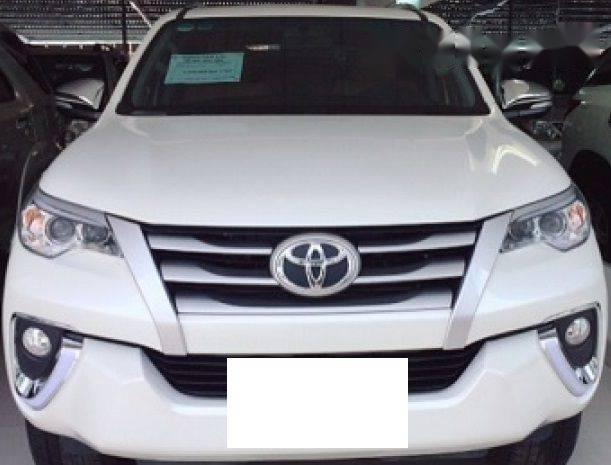 Bán lại xe Toyota Fortuner 2.4G đời 2017, màu trắng số sàn