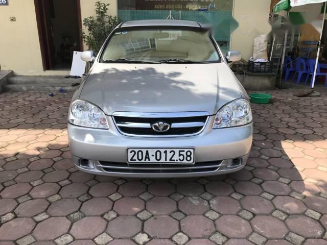 Bán xe Daewoo Lacetti EX sản xuất 2011, màu bạc số sàn