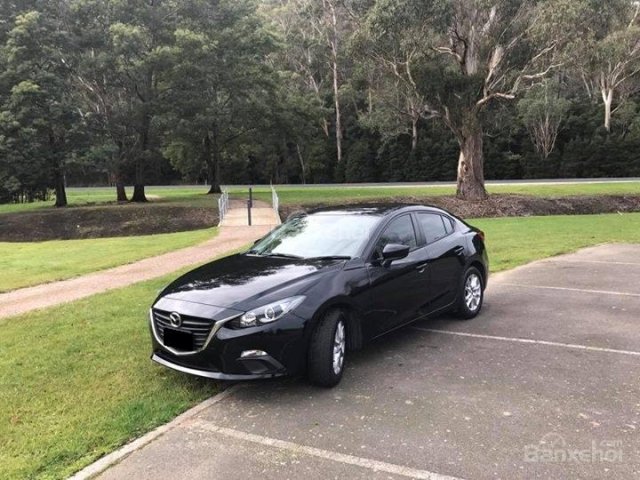 Bán Mazda 3 1.5AT Sedan đời 2015, màu đen, giá 595tr